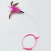 sg-11134201-82625-ml6kbux3k5j690.webp Head mounted cat teaser toy that hangs around your neck easily freeing your hands with a bendable rod